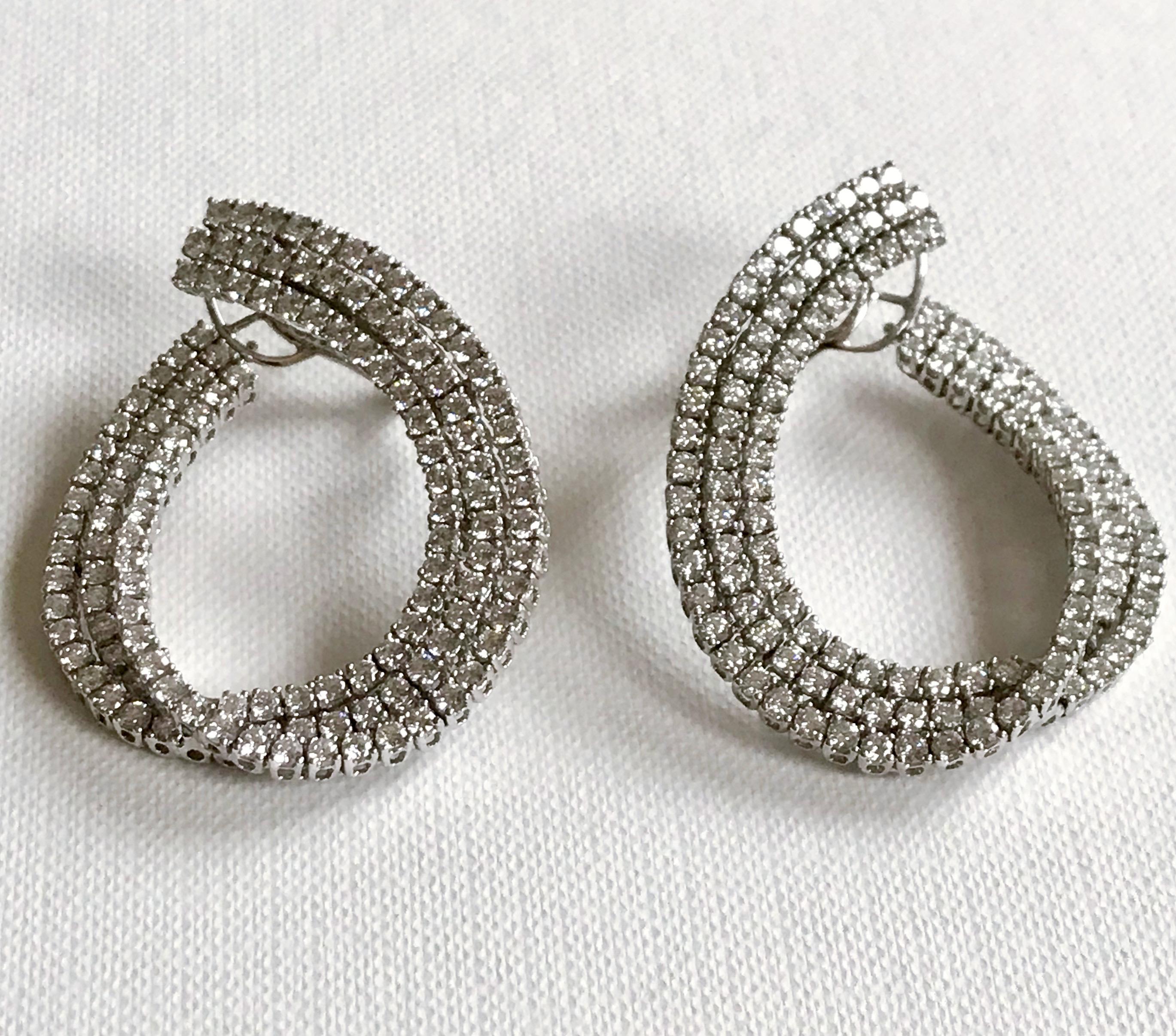 These earrings are made from 18 Karat solid white gold and have been Micro-set with 252 pieces of high-quality white diamonds.
Colour: G, 252.00 pcs. 6.50ct.
Gold's weight: 25.130g 
All our jewellery are new and have never been previously owned or