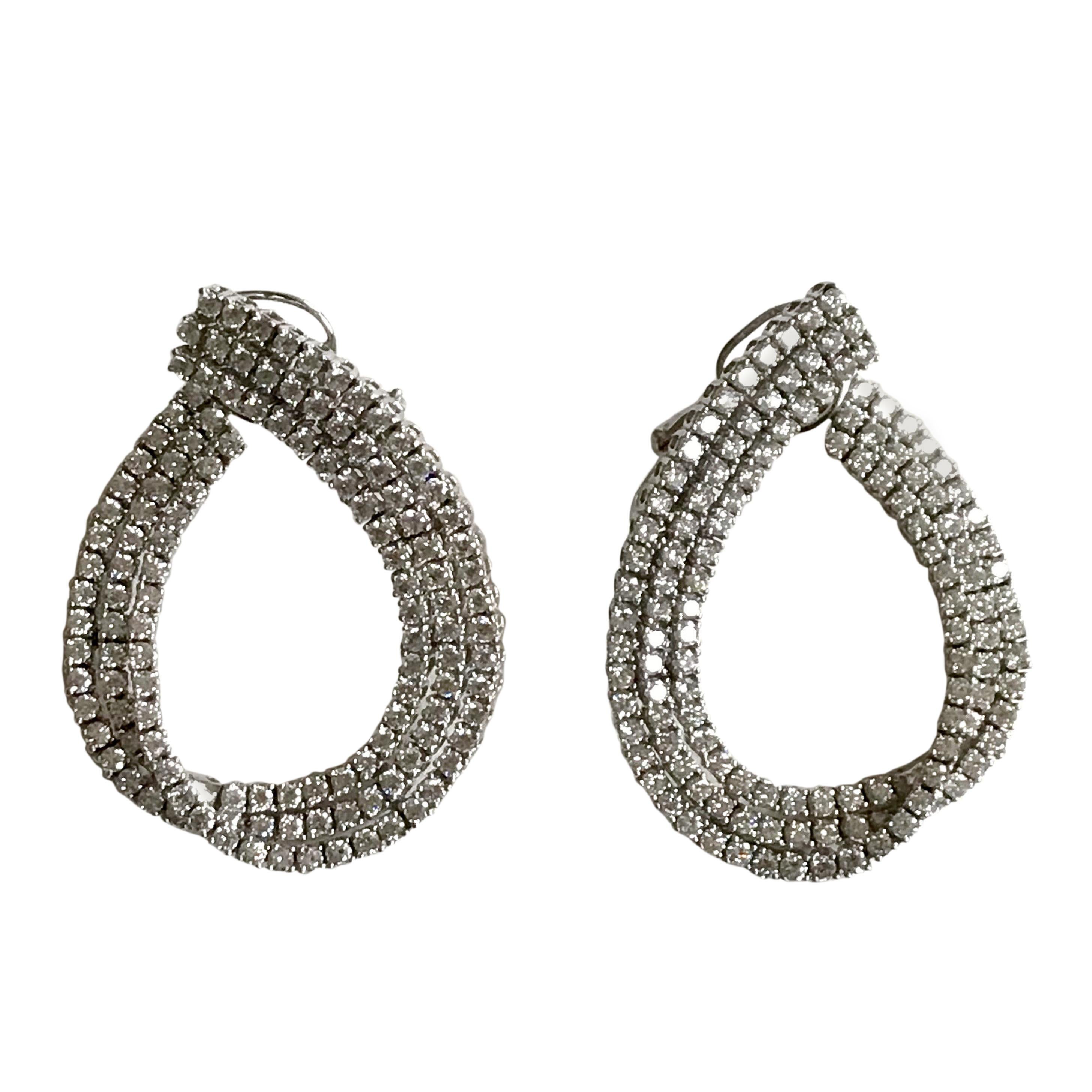 18 Karat Solid White Gold Diamond Swirl Earrings For Sale