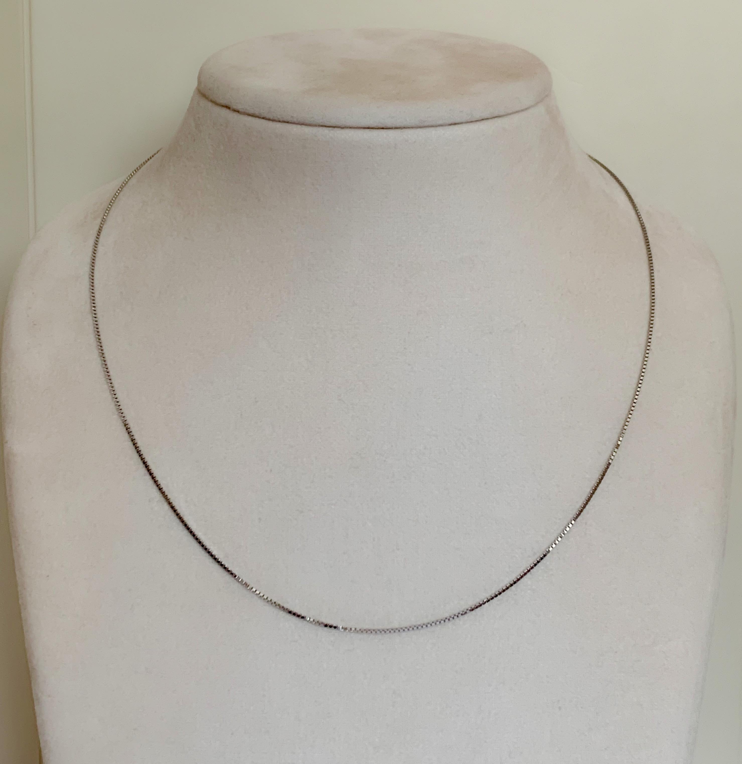This Venice box chain necklace is made of 18Karat solid white gold.
Ideal to wear with pendants, layered with other chains or just on its own.
Length : 45.00 cm 
Gauge:   0.8mm
Hallmark: London’s Goldsmiths’ Company –  Assay Office 
All our