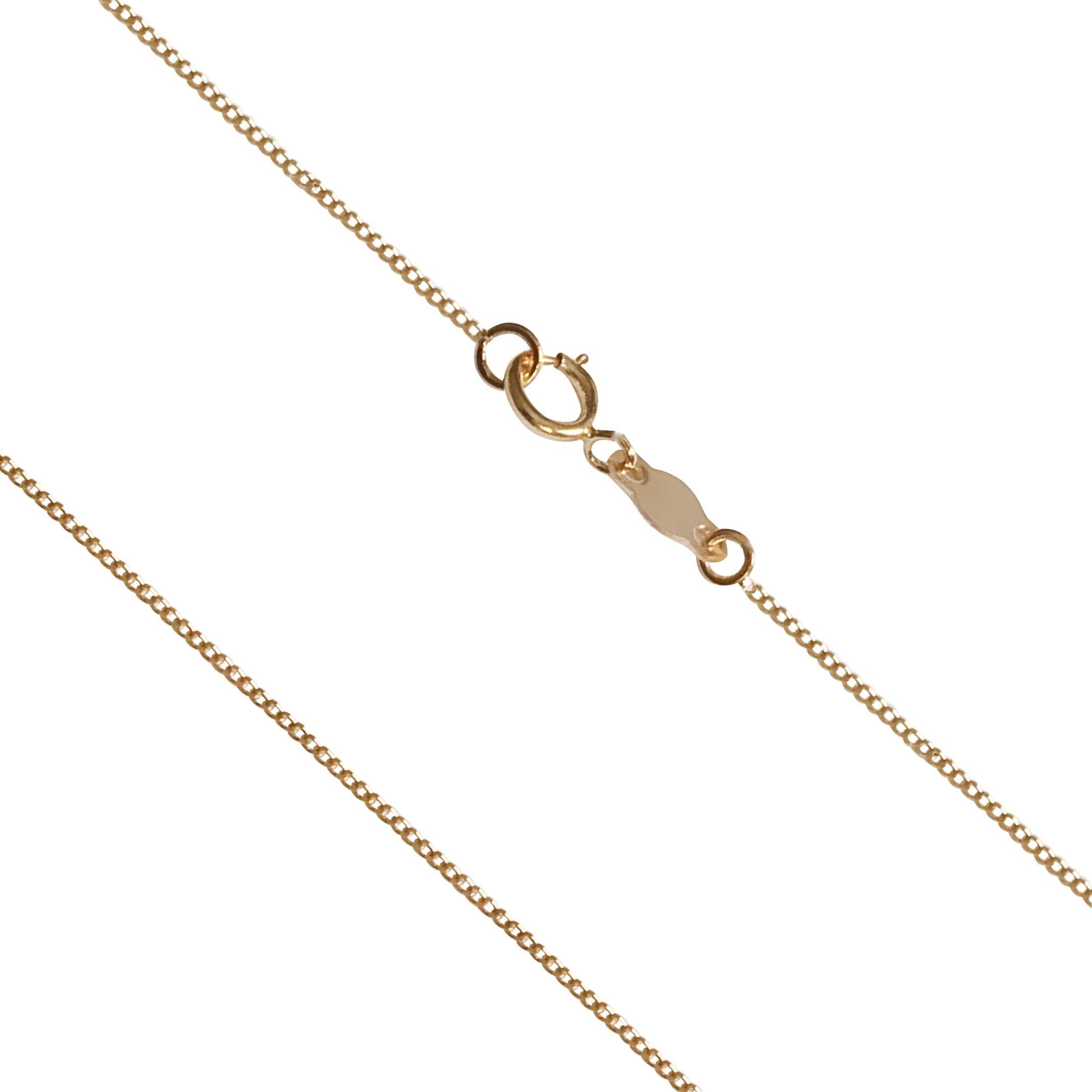 This fine chain necklace is made of 18 Karat solid yellow gold and is the lightest chain in our entire collection.
Hallmark: London’s  Goldsmiths’ Company –  Assay Office
Length:40.00cm
Width: 0.7mm
Weight: 1.25g
All our jewellery are new and have