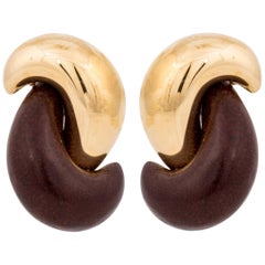 Boucles d'oreilles tourbillon en or 18 carats et bois de feuillus