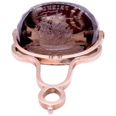 Antique 18 Karat Swivel Fob of Smokey Quartz with 3 Sided Intaglio Scenes, circa 1900