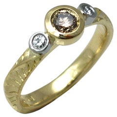 18 Karat Textured Gold Three Stone Brown and White Diamonds Ring, Small