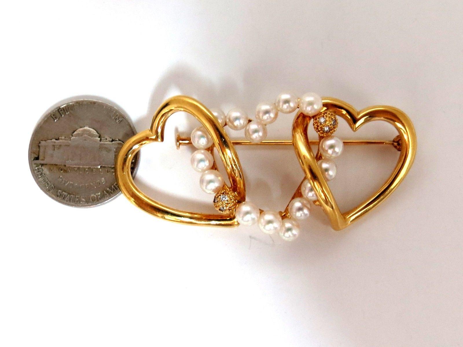 Three Heart Love

Vintage Medallion Pearl Pendant Brooch 

.10ct natural diamonds within gold balls

4mm Cultured pearls

18kt yellow gold

15 grams

55 x 27mm
