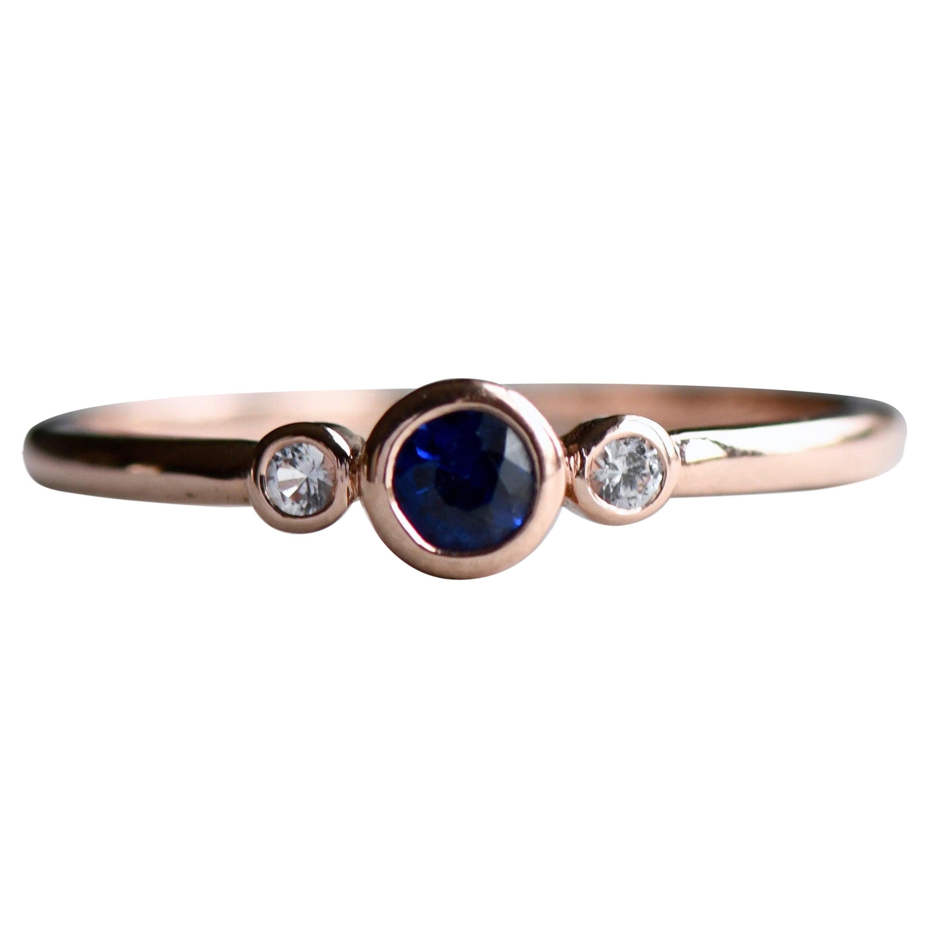 For Sale:  18 Karat Three Stone Sapphire Diamond Rose Gold Ring