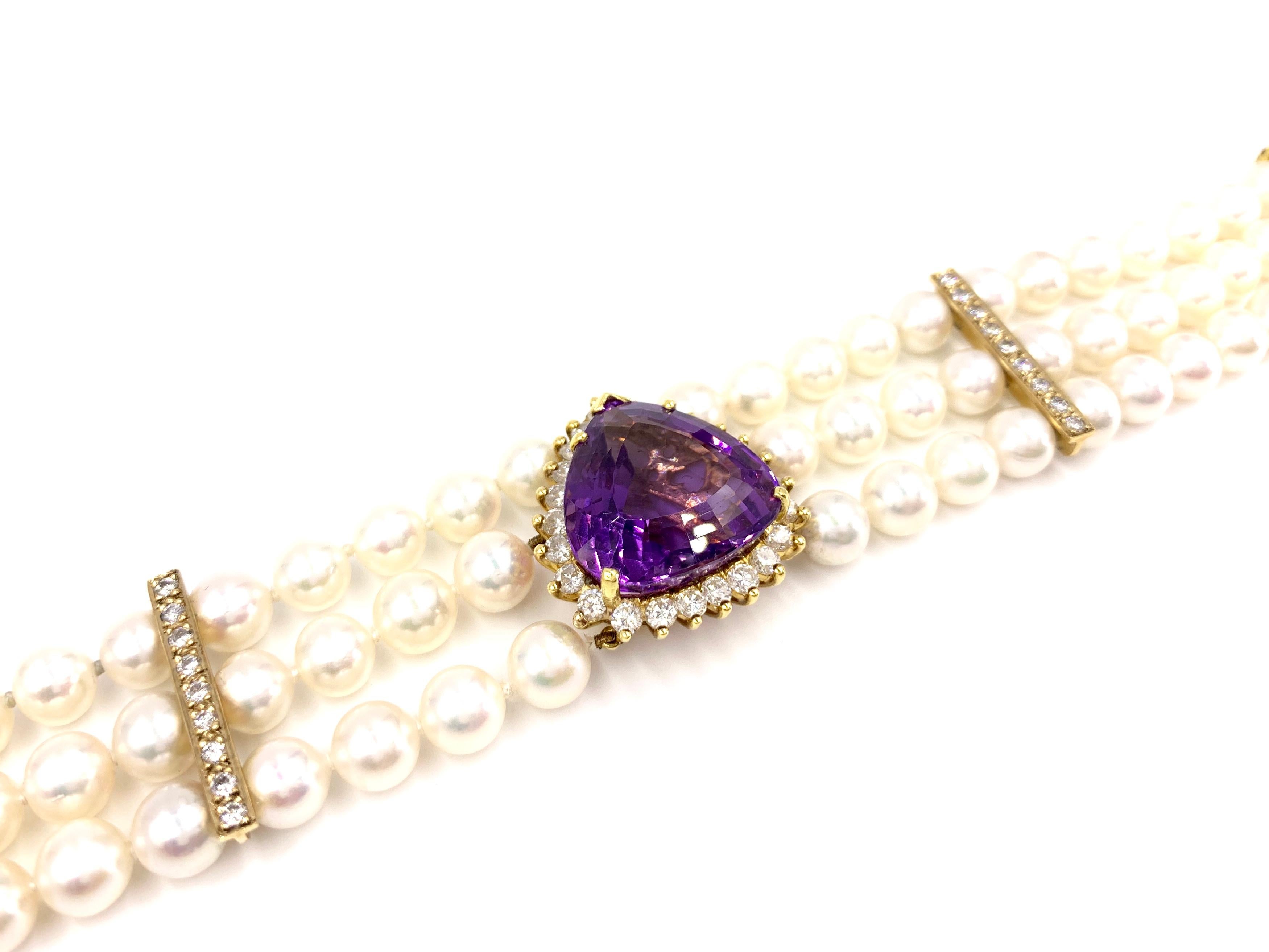 Victorian 18 Karat Three-Strand Pearl Bracelet with Amethyst and Diamond Center For Sale