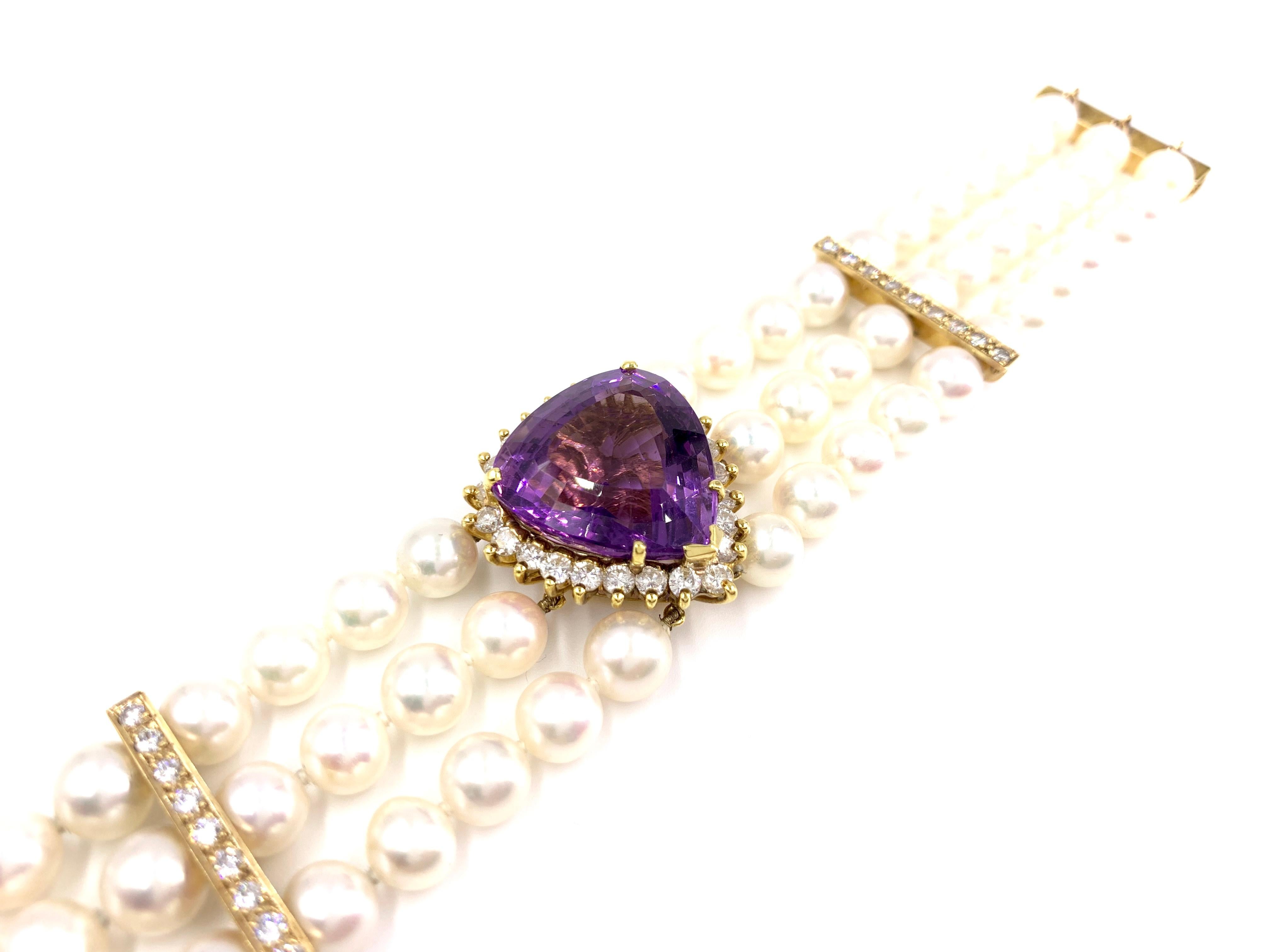 18 Karat Three-Strand Pearl Bracelet with Amethyst and Diamond Center In Good Condition For Sale In Pikesville, MD