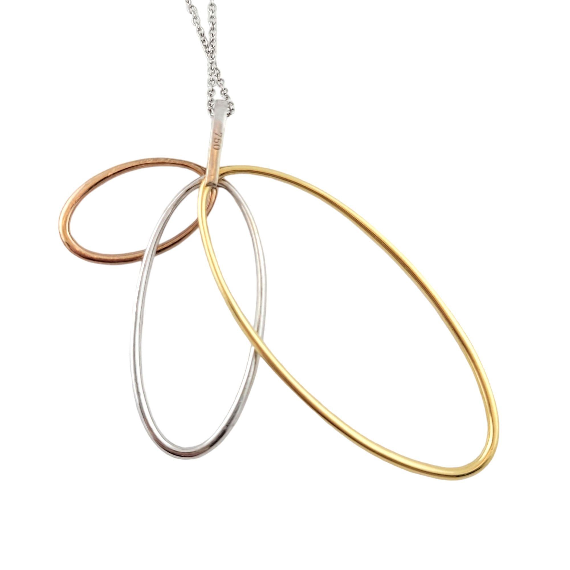 Vintage 18 Karat Three Tone Gold and Diamond Pendant Necklace-

This sparkling pendant necklace features 187 round brilliant cut diamonds set in beautifully detailed 18K rose, yellow and white gold.

Approximate total diamond weight: 1.90