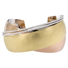 Bracelet croisé en or tricolore 18 carats et diamants 1,04 carat, fabriqué en Italie