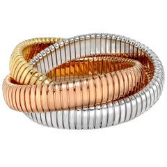 18 Karat Tri-Colored Gold Tubogas Rolling Bangle Bracelet