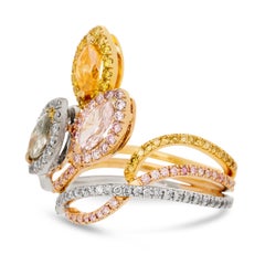 18 Karat Tri-Gold Fancy Blue, Pink and Yellow Diamond Intertwining Swirl Ring