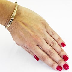 18 karat tricolor gold twist bangle