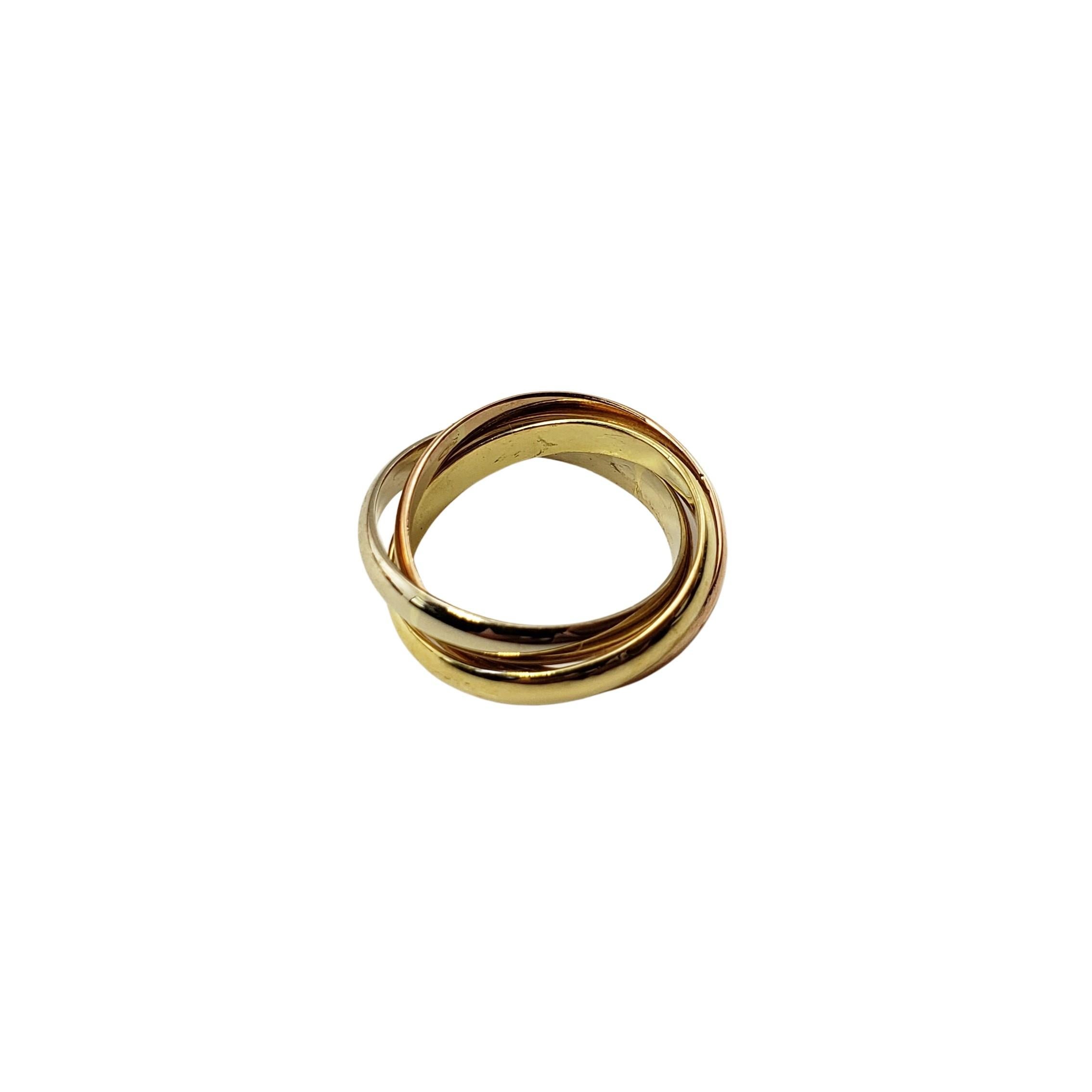 18 Karat Tricolor Rolling Ring Size 4-

This classic rolling ring features a trio of connected bands crafted in 18K yellow, white and rose gold.  Width of each band:  2.5 mm.

Ring Size: 4

Weight:  2.8 dwt. /  4.5 gr.

Stamped: 160  AR

Very good