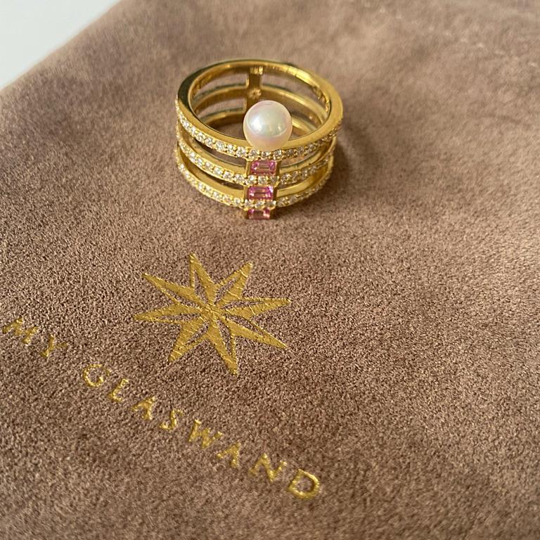 Contemporary 18 Karat Triple Band Ring with Diamonds, Pink Sapphire Baguettes and Pearl For Sale