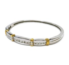 18 Karat Two-Tone Channel-Set Diamond Bangle Bracelet