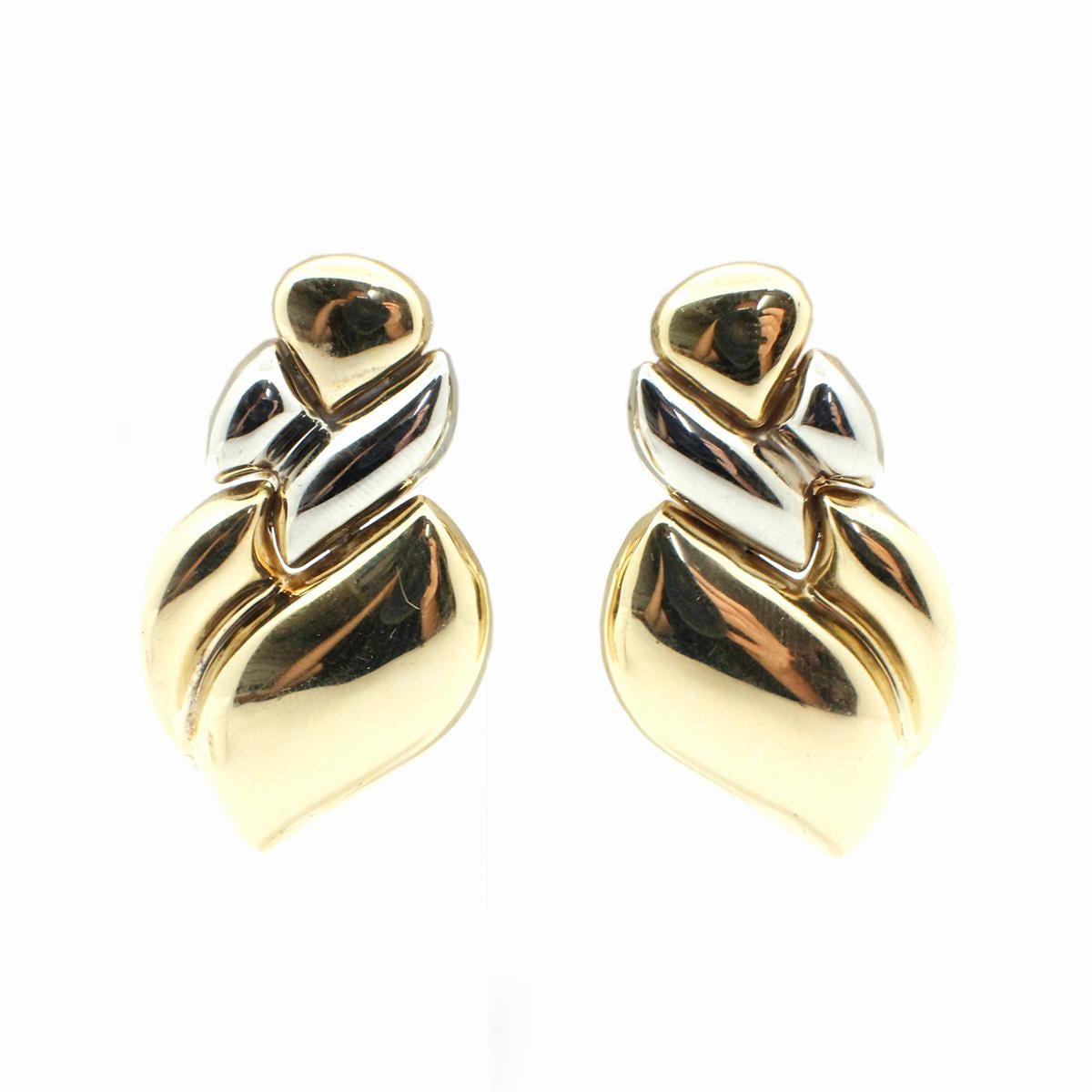 These sensational earrings are made in 18k two-tone gold by designer Chimento. These earring fold when the white and yellow gold meet to make the earrings more flexible and easy to wear. Set with standard posts, and omega clips make these earrings