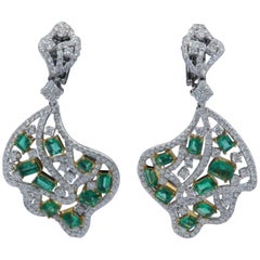 18 Karat Two-Tone Diamond 
Emerald Earrings