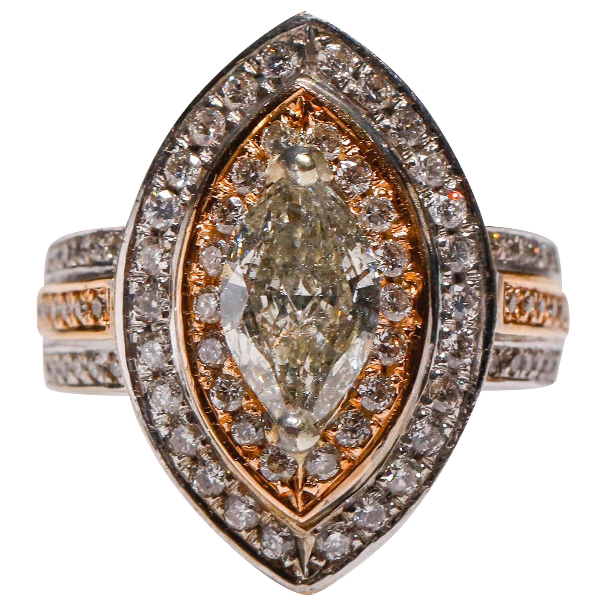 18 Karat Two-Tone Gold 2.9 Ct Marquise Shape Diamond Engagement Ring

Crafted in 18 kt Two-Tone Gold, this Unique design showcases a white Diamond 2.9 TCW Marquise diamond, set in a solid two-tone Gold, Polished to a brilliant shine.

Gold Purity: