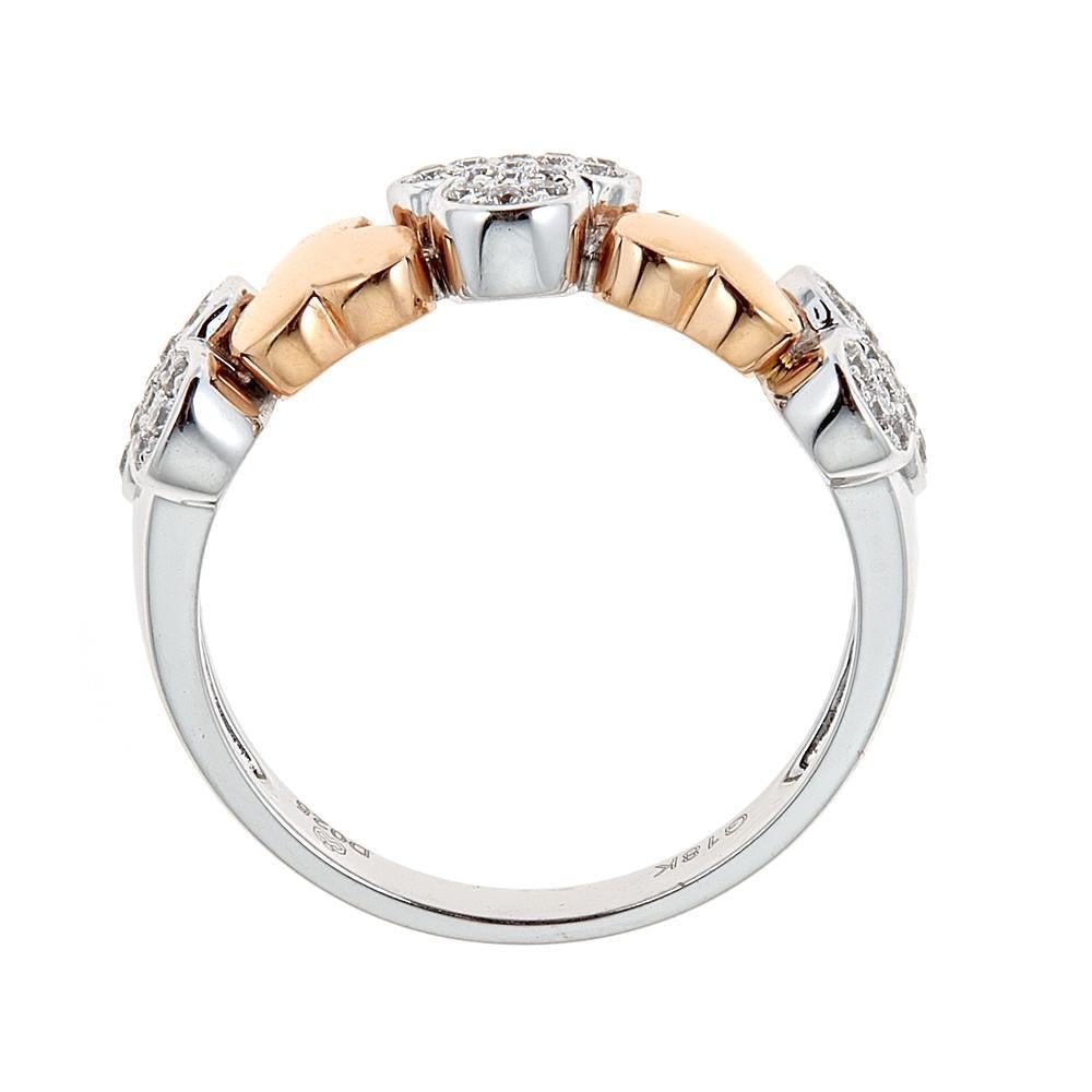 18 Karat Two-Tone Gold and 0.25 Carat Diamond Ring Flower Designer Band Jewelry

Adorable everyday diamond band ring. Featuring diamond-accented pieces alternating with yellow gold. Diamonds, totaling 1/4 of TCW are shimmering, adding most