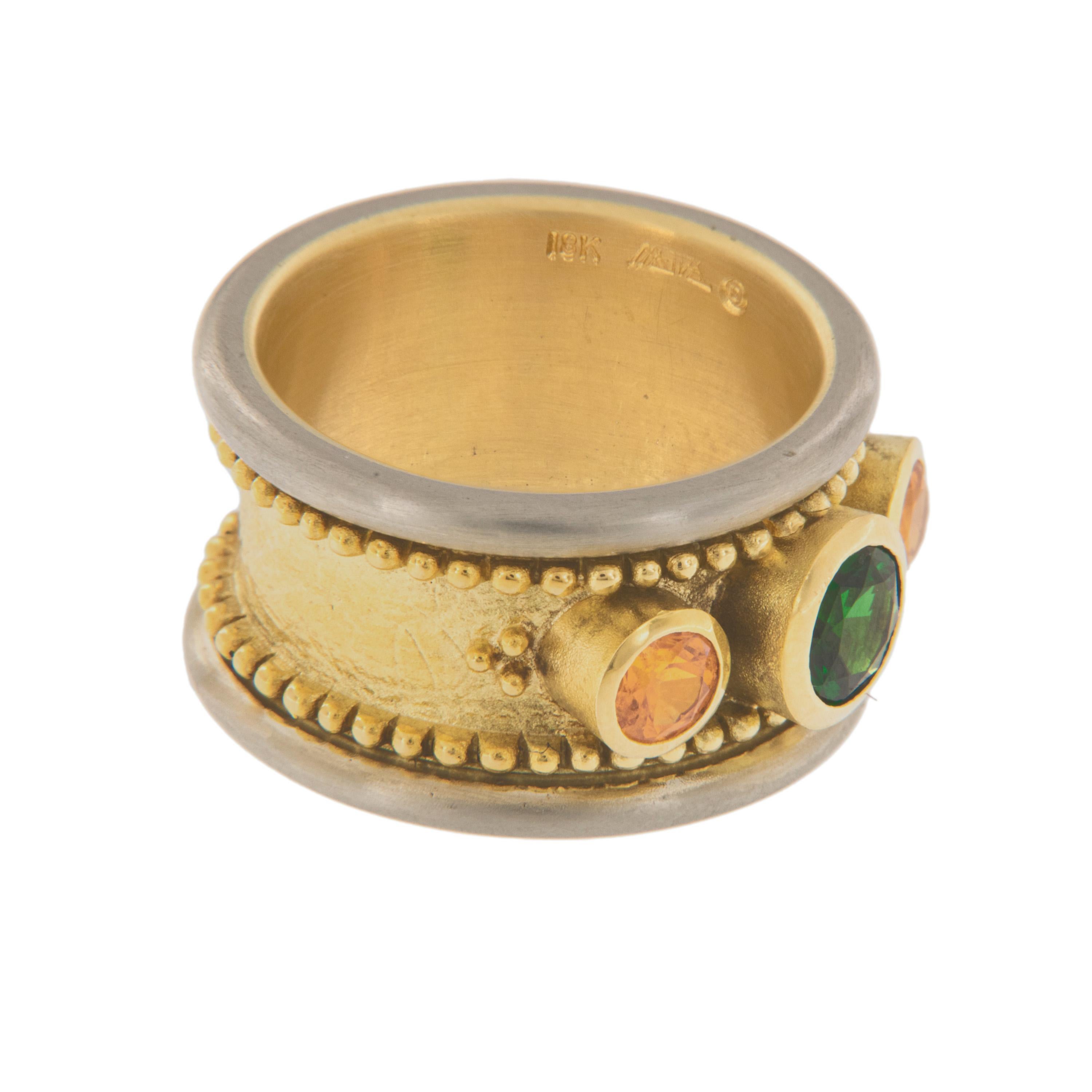 Classical and progressively modern describes Patrick Irla's jewelry. He hand makes his pieces through lost wax casting in his studio from start to finish with attention to detail. This beautiful band ring combines 18 karat yellow & white gold with