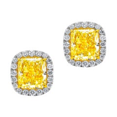 18 Karat Two Tone Stud Earrings with White Diamonds on the Side