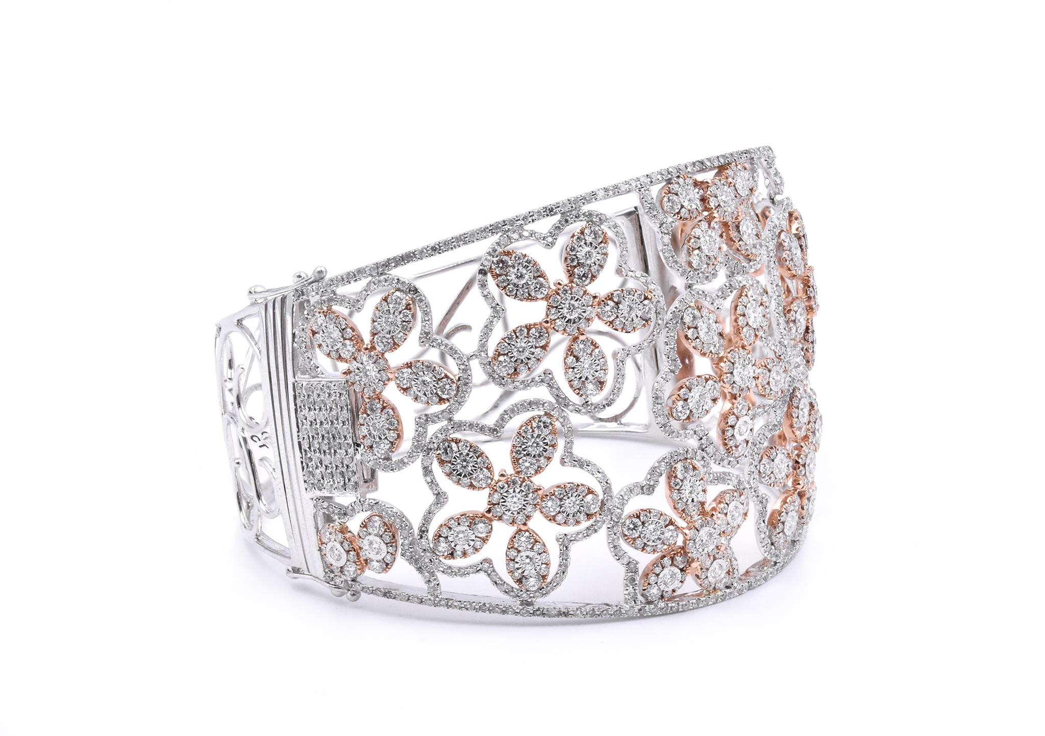 Material: 18K white and rose gold
Diamonds: 597 round cut = 7.95cttw
Color: G
Clarity: VS
Dimensions: bracelet will fit up to a 7-inch wrist
Weight: 47.60 grams
