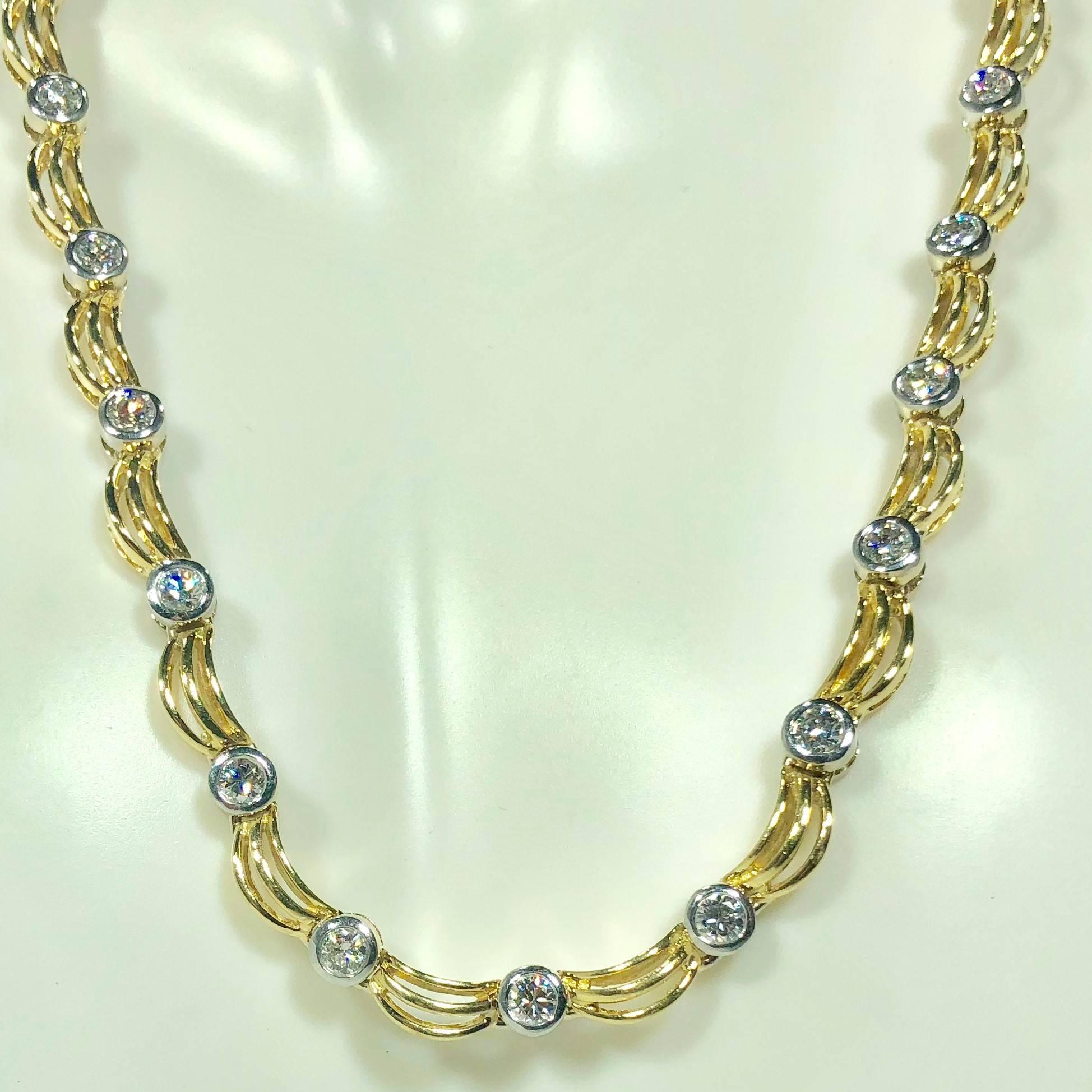 18 karat 2 tone white/yellow gold and 1.0 carat diamond fancy link necklace. This substantial 18 karat yellow and white gold two toned creation weighs 40.7 grams, 26.2 dwt.. The fancy link style and design of this piece  incorporates circular
