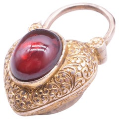 18 Karat Victorian Garnet Heart Gate Padlock Charm