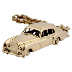 18 Karat Vintage Cartier Rolls Royce Keychain with Moveable Wheels