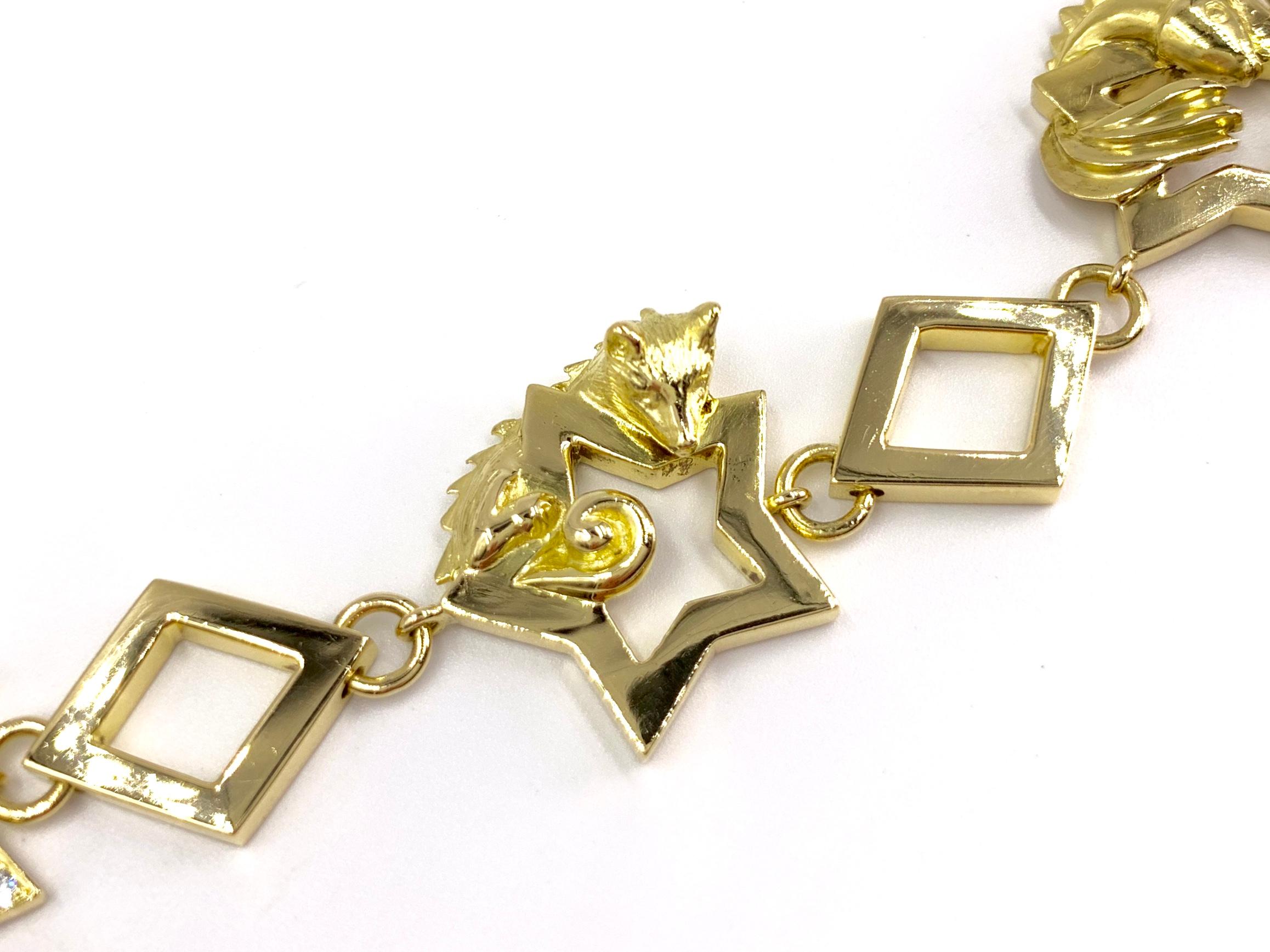 18 Karat Vintage Star Animal Charm Bracelet with Diamonds and Rubies 2