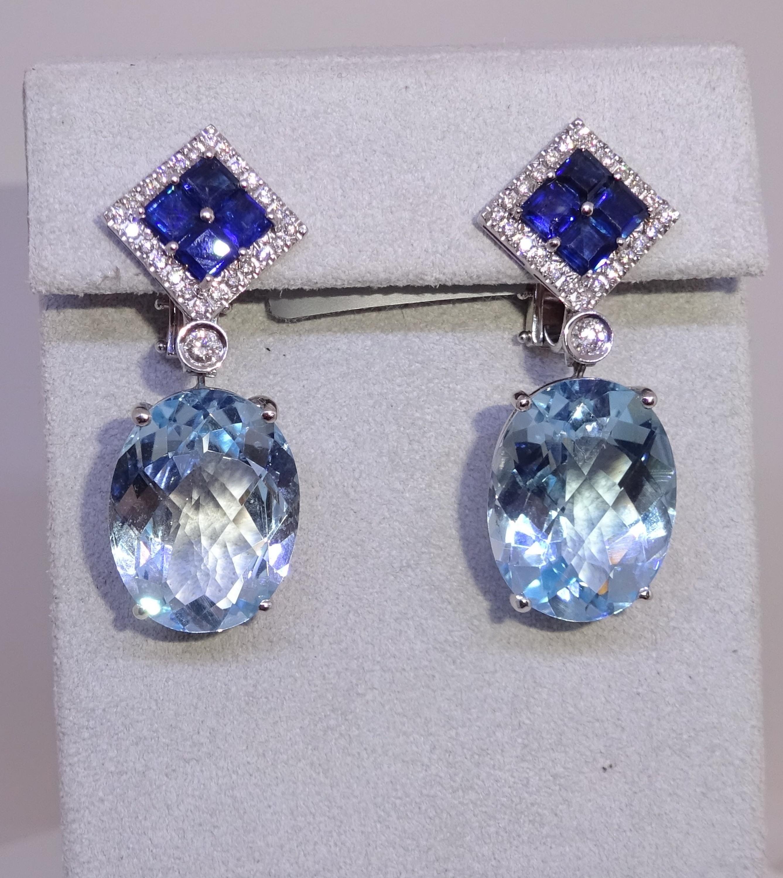 18 Karat WG Diamond,Topaz and Sapphire Dangle Earrings

50 Diamonds 1,23  Carat H SI
8 Sapphires  7,50  Carat
2 Topaz 39.00 Carat


Founded in 1974, Gianni Lazzaro is a family-owned jewelry company based out of Düsseldorf, Germany.
Although rooted