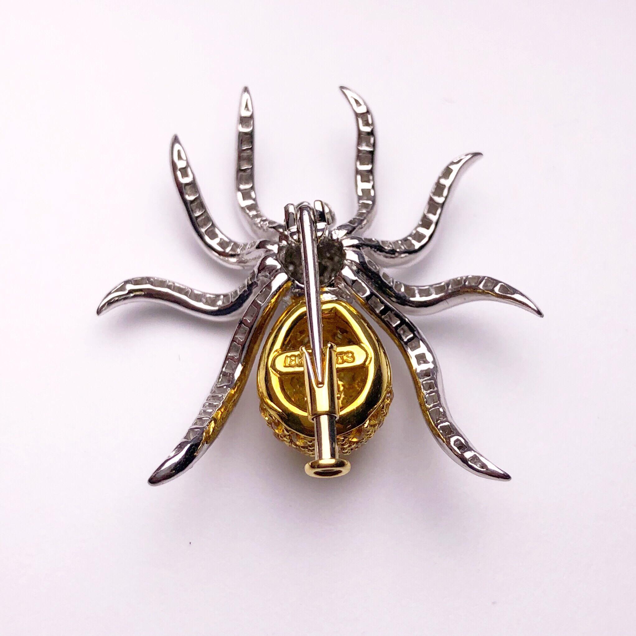 Whimsical and wearable is the best way to describe this lovely spider brooch. Designed with 1.00 carats of brilliant cut diamonds and 1.97 carats of brilliant cut yellow sapphires. The spider measures 1.25