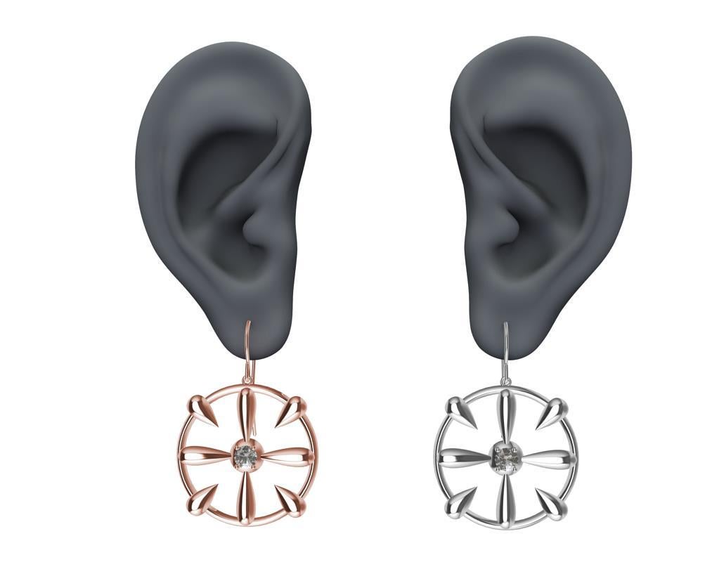 Le designer de Tiffany, Thomas Kurila, a créé ces boucles d'oreilles en or blanc 18 carats et diamant GIA, boucles d'oreilles assorties pour  une soirée excentrique. Ce modèle de boucle d'oreille est issu d'esquisses d'inspirations de travaux de