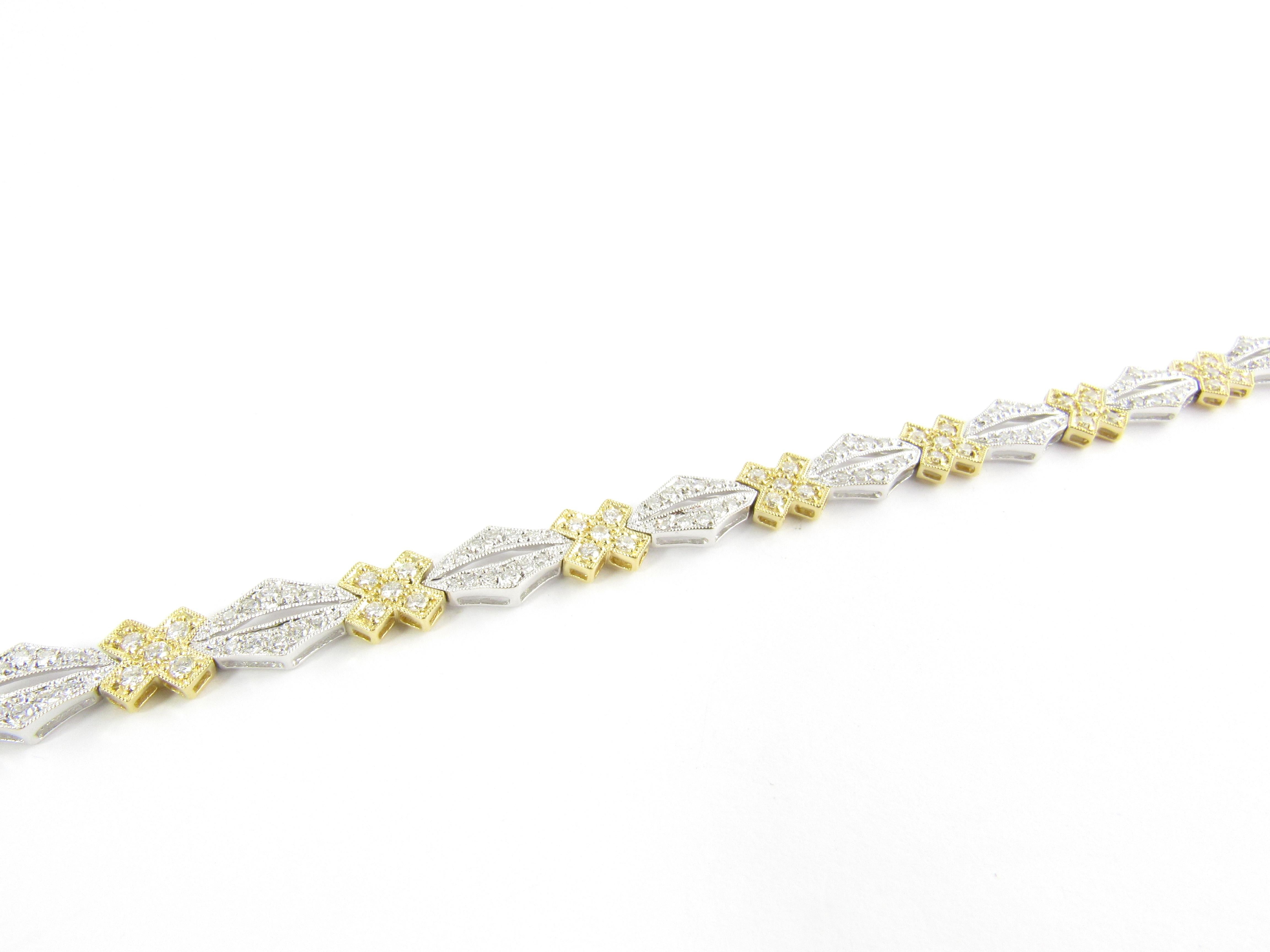 Vintage 18 Karat Gelb- und Weißgold Diamantarmband

Dieses spektakuläre Armband ist mit 198 runden Diamanten im Brillantschliff besetzt, die in wunderschön detailliertes 18-karätiges Weiß- und Gelbgold gefasst sind. Breite: 7 mm.