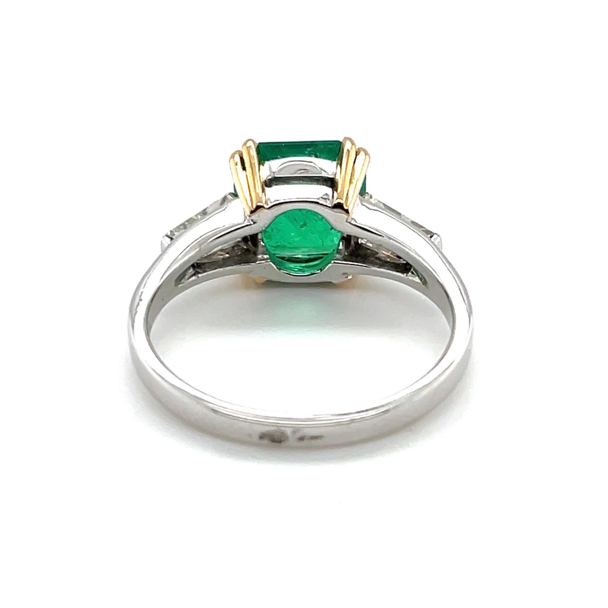 Emerald Cut 18 Karat White and Yellow Gold Emerald and Diamond Three-Stone Ring For Sale