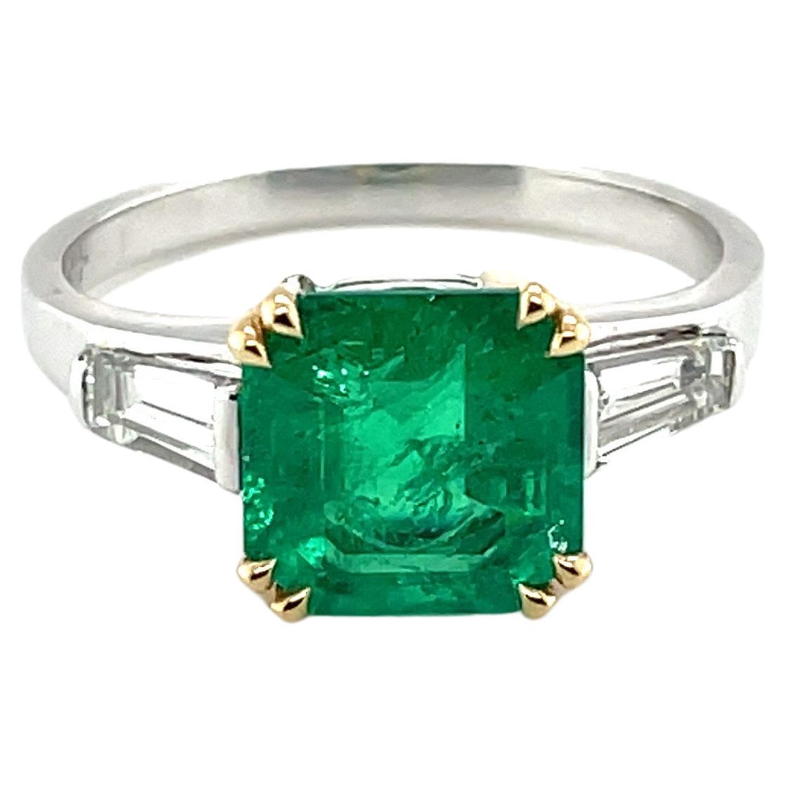 18 Karat White and Yellow Gold Emerald and Diamond Three-Stone Ring For Sale