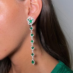 18 Karat White and Yellow Gold, White Diamonds and Emeralds Stiletto Earrings