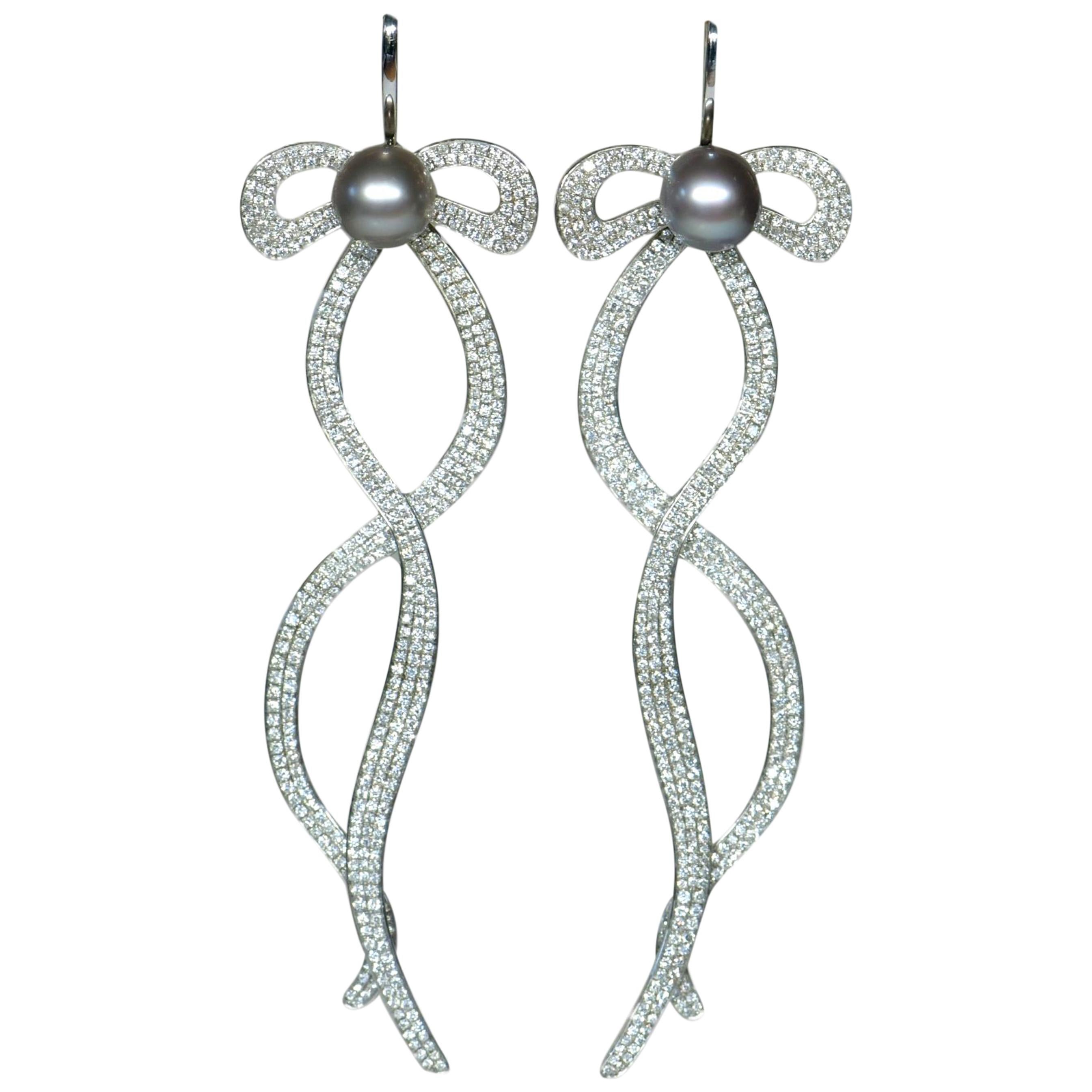 18 Karat White Diamond Pearl Long Earrings with Bow For Sale