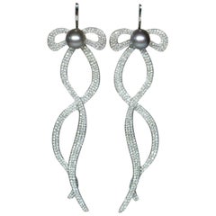 18 Karat White Diamond Pearl Long Earrings with Bow
