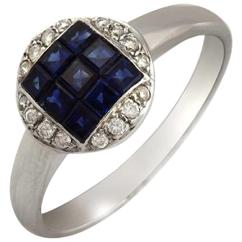 18 Karat White Gold 0.09 Carat Diamonds and 1.37 Carat Blue Sapphire Ring For Sale