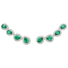 18 Karat White Gold 0.46 Carat White Diamonds 1.68 Emeralds Crawler Earrings