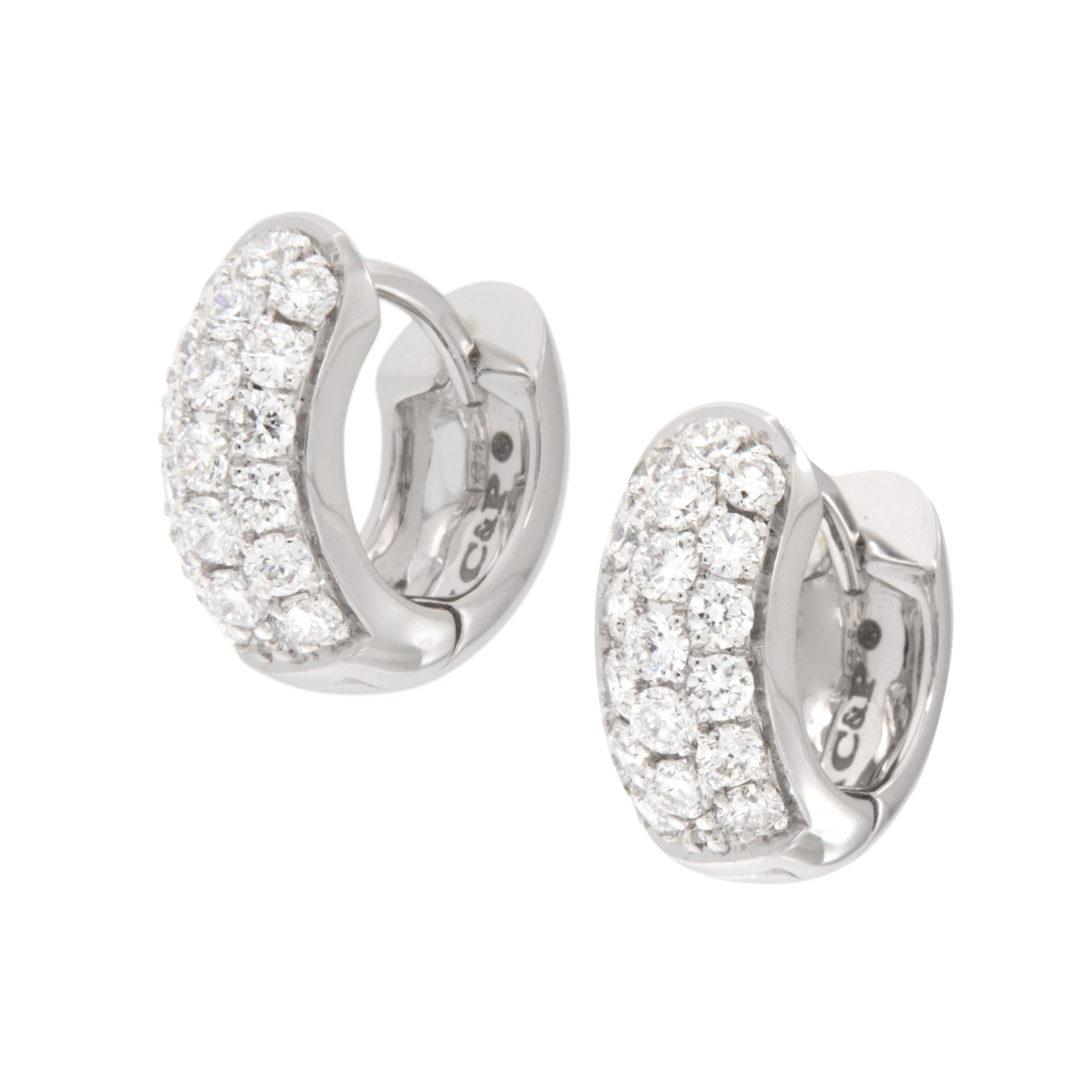 Beautiful pave' diamond earrings that will be the most comfortable earrings you own too! Made from fine 18 karat white gold, these huggy earrings boast 0.48 Cttw. of VS clarity, G-H color diamonds for earrings that look paved with diamonds.