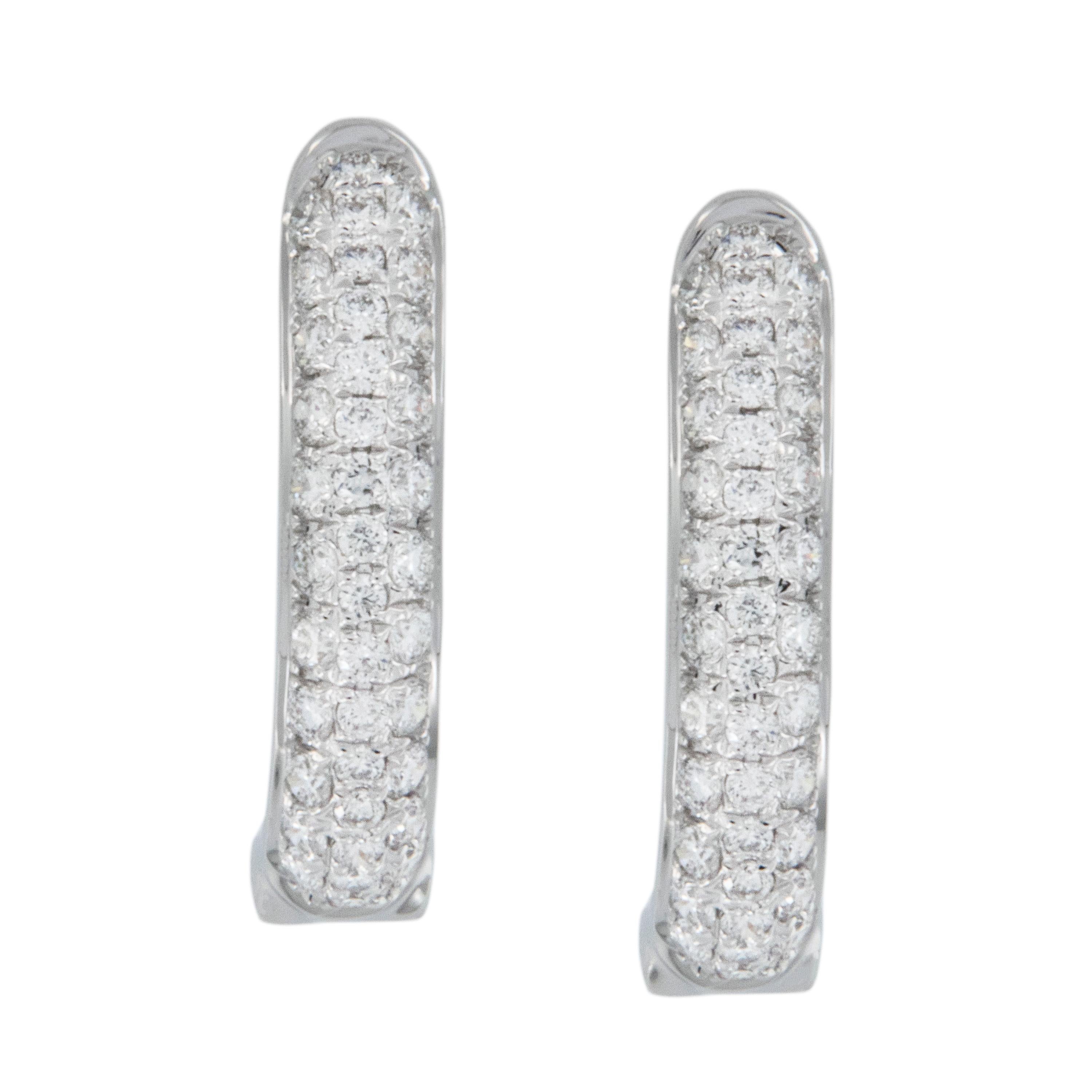 Classic pave' diamond hoop earrings for the classic lady! In most desired round shape with 0.49Cttw. diamonds and secure omega clip backs. Come on - you're worth it! Complimentary signature wrapping & presentation box included.
18KWG
Diamonds= 0.49