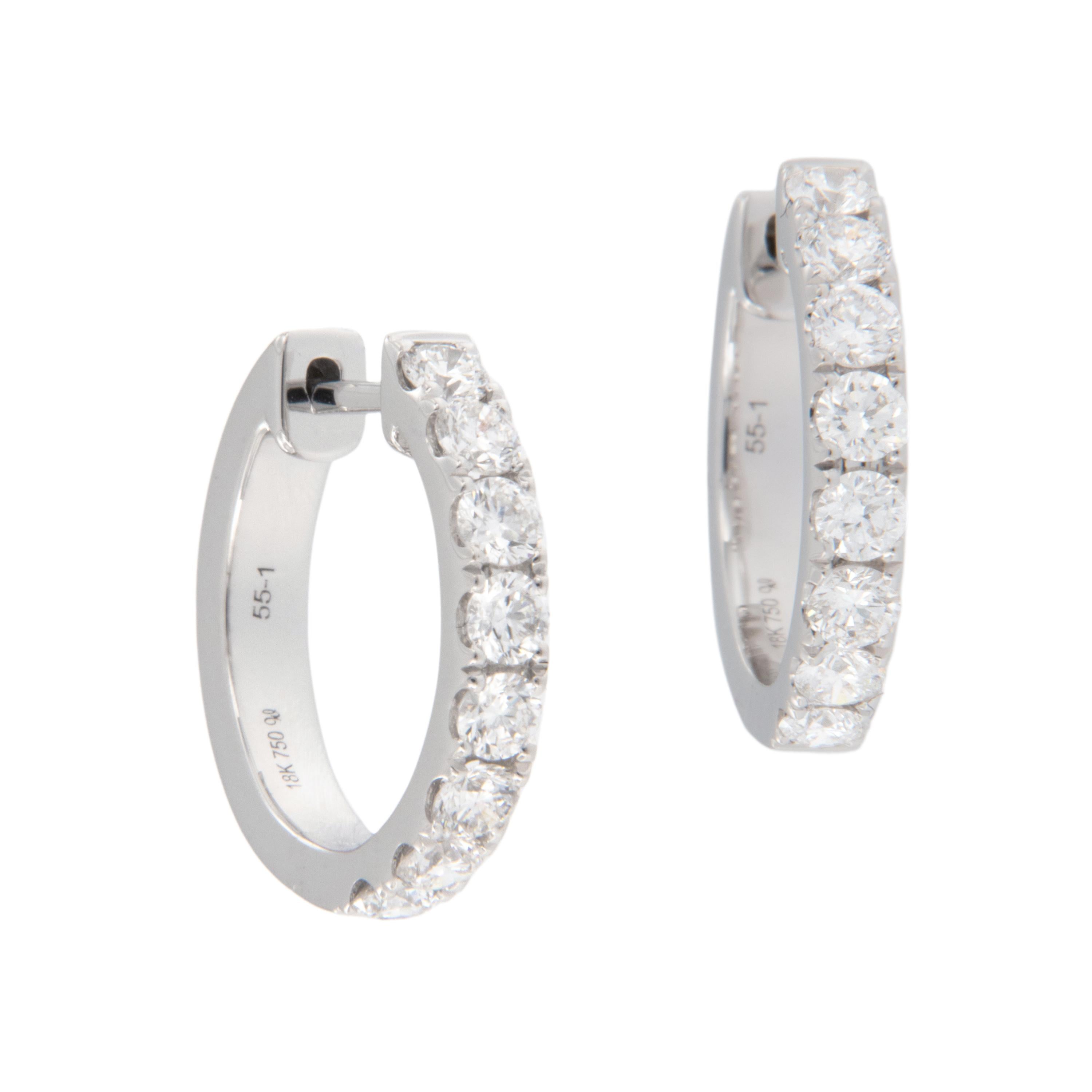 These adorable earrings are perfect for every day wear with flair! Made from fine 18 karat white gold these round hoop earrings with 16 G VS diamonds = 0.62 Cttw will be your most comfortable go to earrings. 2.3mm wide x 14mm diameter. Complimentary
