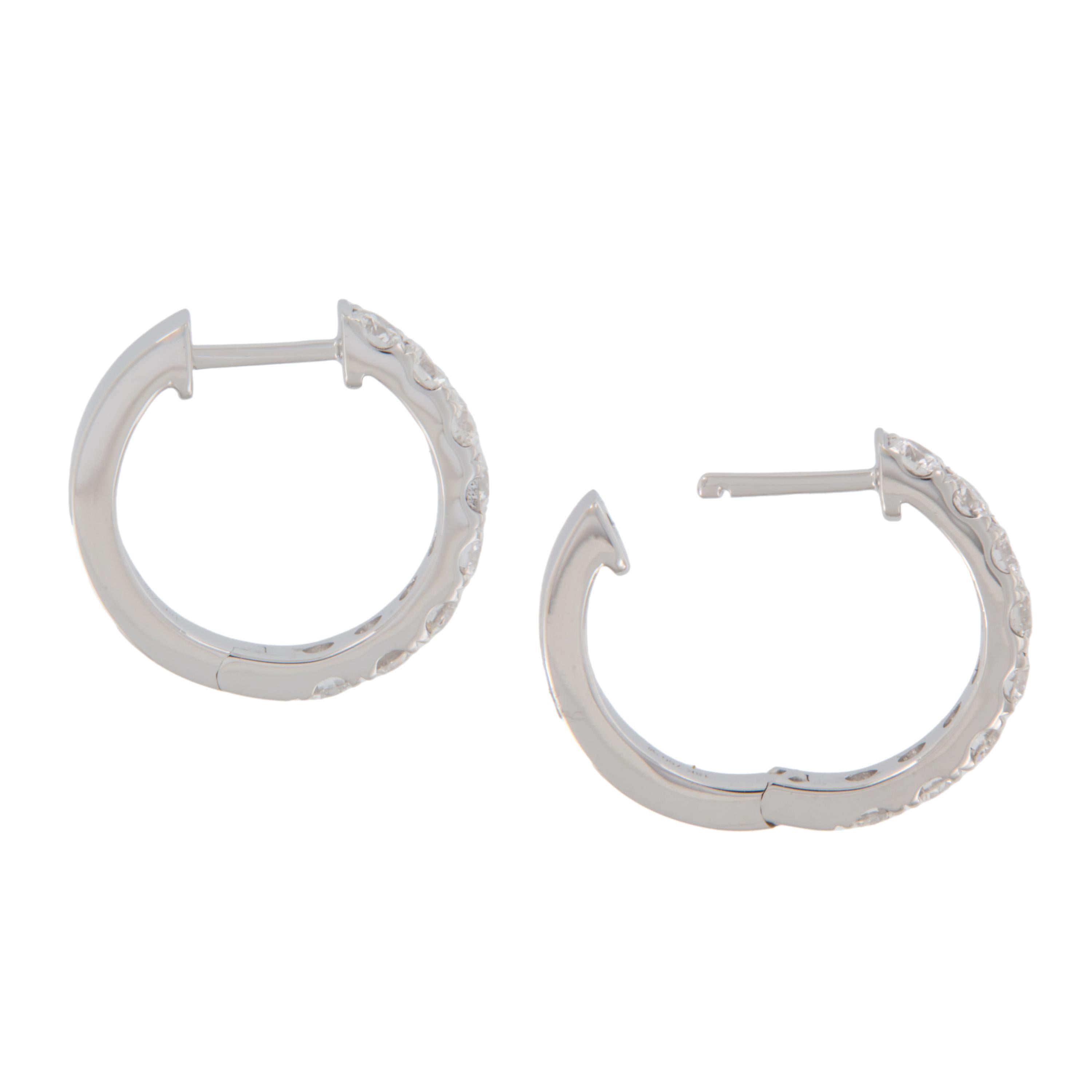 18 Karat White Gold 0.62 Cttw Diamond Mini Hoop Earrings In New Condition For Sale In Troy, MI