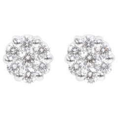 Clous d'oreilles en or blanc 18 carats sertis d'un diamant de 0,68 carat