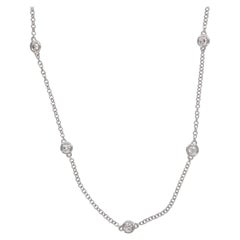 Collana a filo in oro bianco 18 carati con diamanti naturali per un totale di 0,73 carati