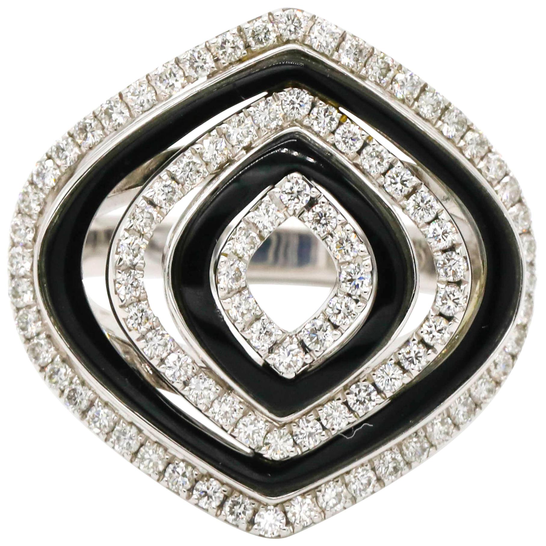 18 Karat White Gold 0.75 Carat Diamond Pave Black Onyx Cocktail Ring

This modern ring features a total of 0.75 carats of diamond round shape and Black Onyx Gemstone Set in 18K White Gold.

We guarantee all products sold and our number one priority