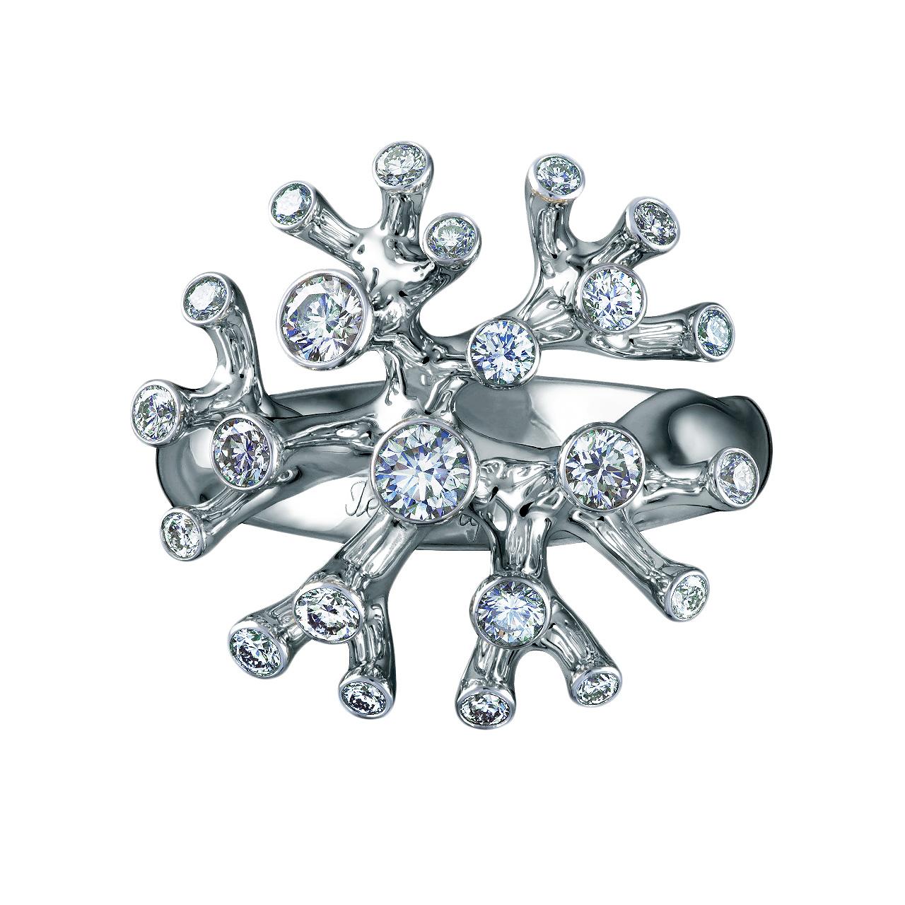 - 24 Round Diamonds - 0.85 ct, E-F/ VS
- 18K White Gold 
- Weight: 10.90 g
- Size: 17 mm
The ring from the Corals collection of Jewellery Theatre in 18k white gold decorated 0.85 ct of diamonds. Ring has a heel at the bottom decorated with a