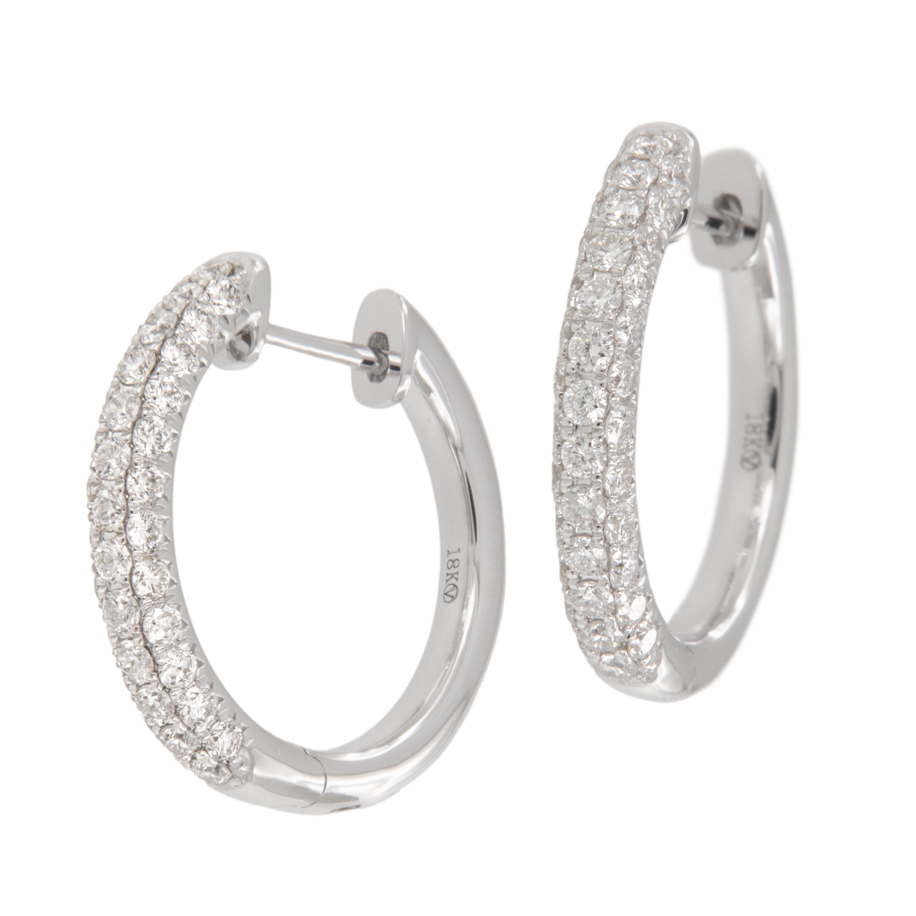 Realizzati in oro bianco 18 carati, questi orecchini stile huggie saranno i più comodi che possiederai!  Se a ciò si aggiunge che sono incastonati (letteralmente significa lastricati di diamanti) con 74 diamanti bianchi = 0,91 Cttw, si ottiene una